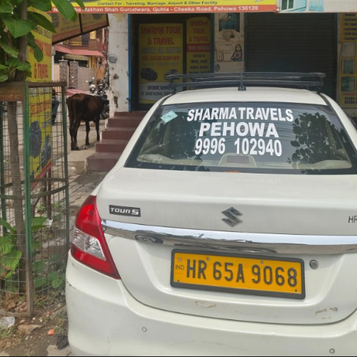  Sharma Tour & Travels Taxi Service